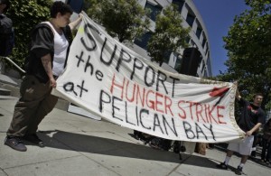 banner-support-the-hunger-strike-at-pelican-bay-at-sf-state-bldg-rally-070111-by-paul-sakuma-ap